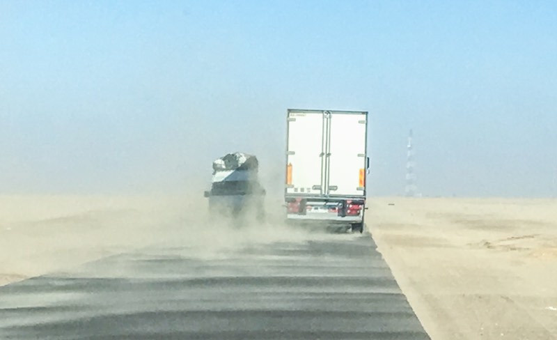 Dangerous traffic in Mauritania sandy road Sahara desert