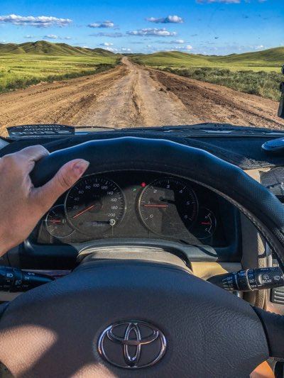 Eveling driving in Kazakhstan women overlanders