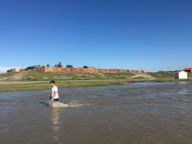 checking riverbed before crossing