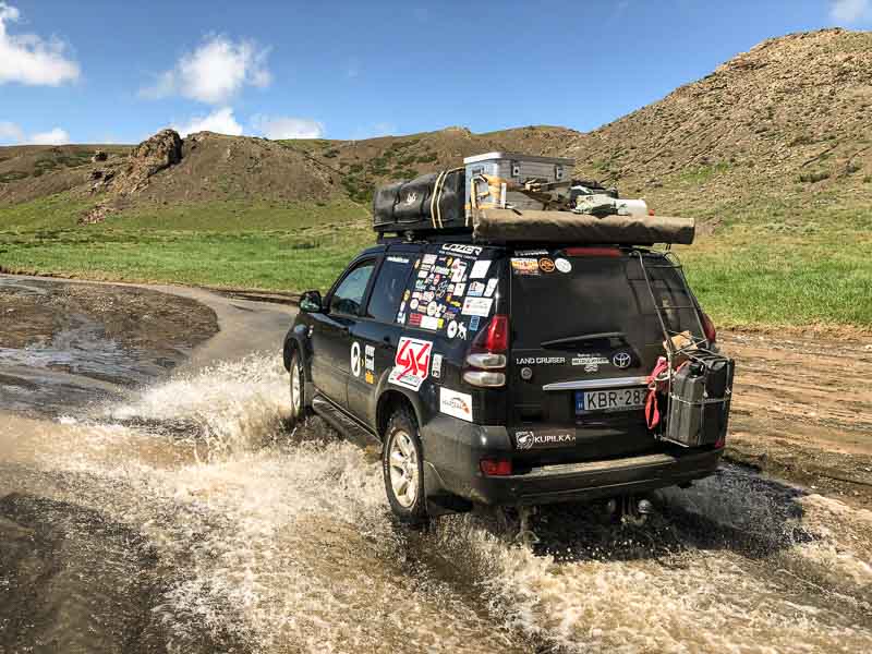 toyota prado in river